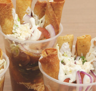 Tacos dorados en vaso